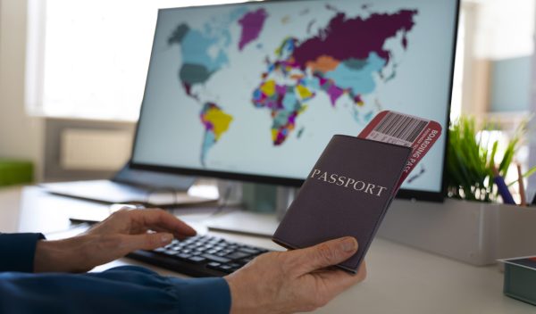 side-view-man-holding-passports