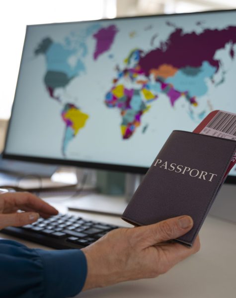 side-view-man-holding-passports